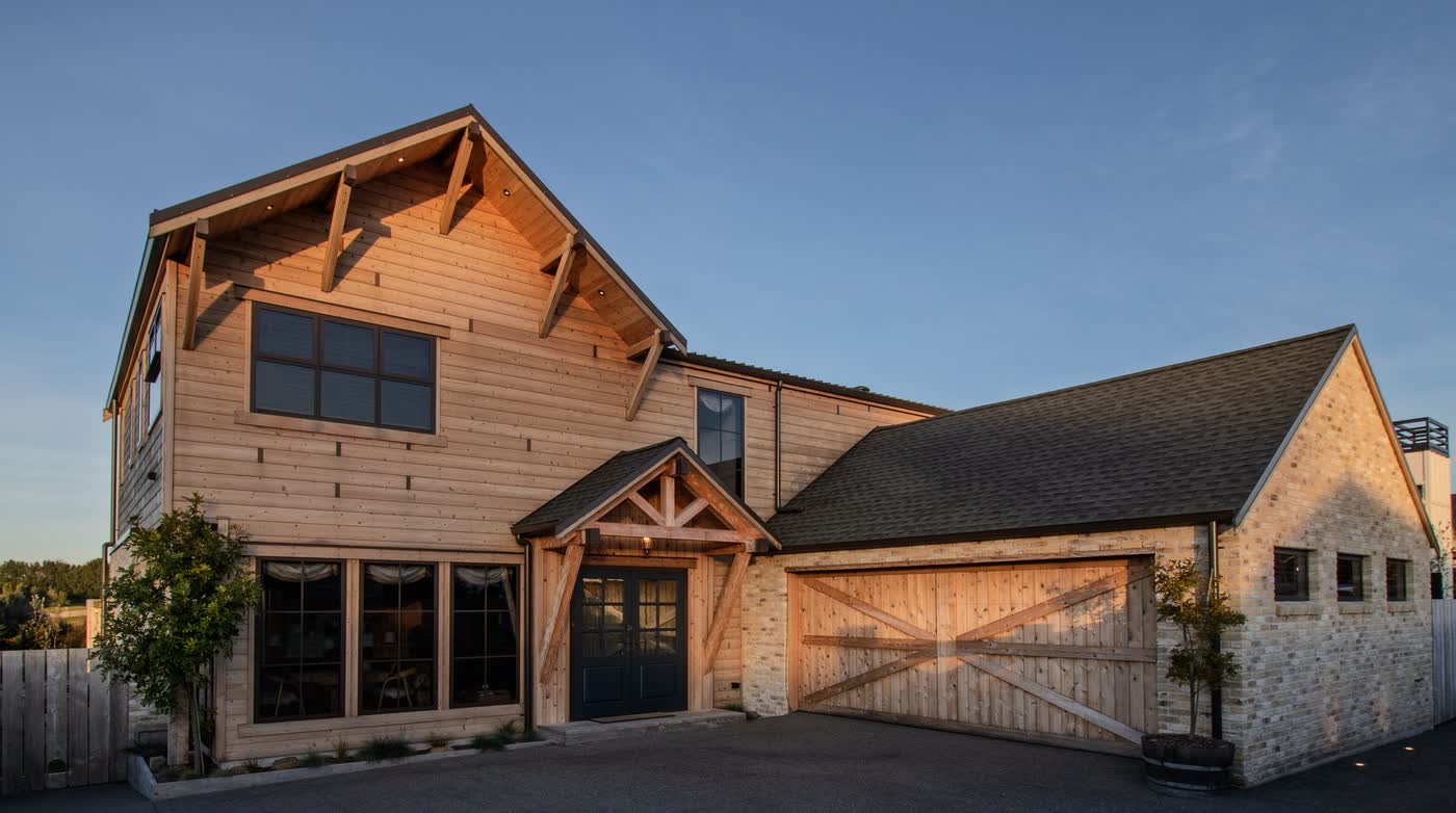 Front exterior of Big Sky Lodge by day, the cover image for the film