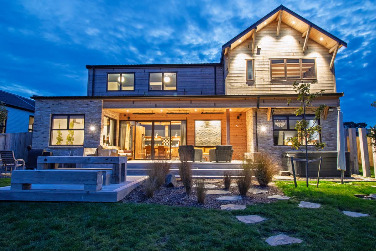 Rear elevation of Big Sky Lodge at dusk, the cover image for the evening showcase film